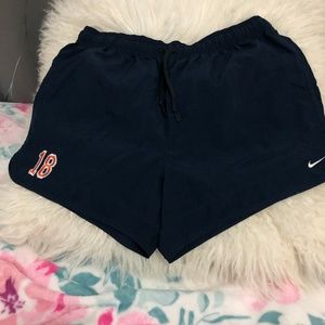 Nike Navy blue shorts: nike logo on the side